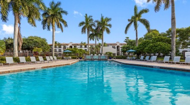 Resort-Style Pool and Palm Trees at Our Apartments in Pembroke