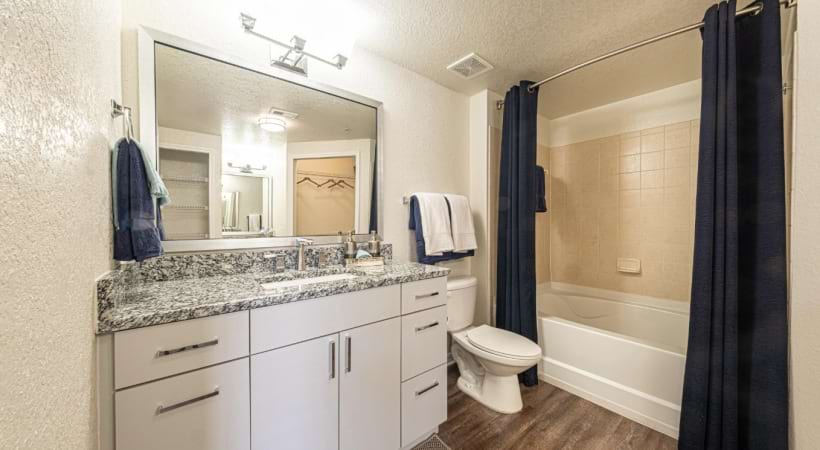 Bathroom with Granite Countertops at Our Apartments in West Palm Beach