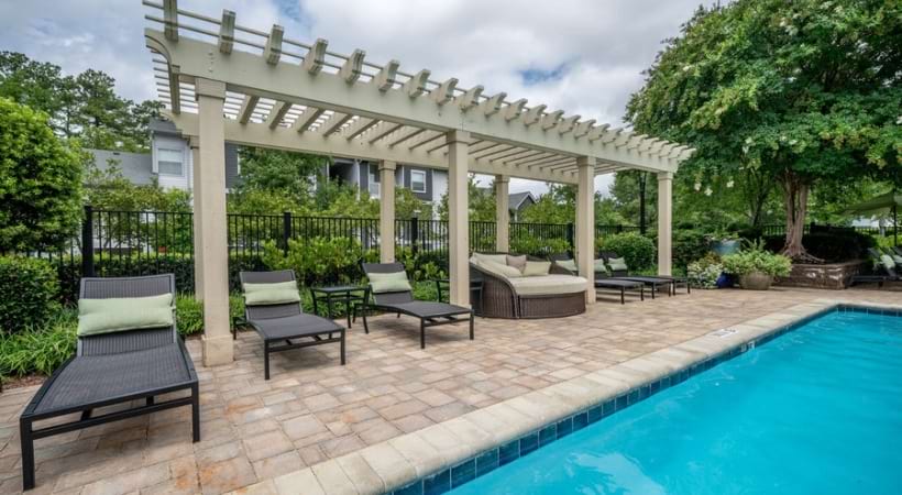 Resort-Style Pool with Lounge Seating at Our RTP Apartments