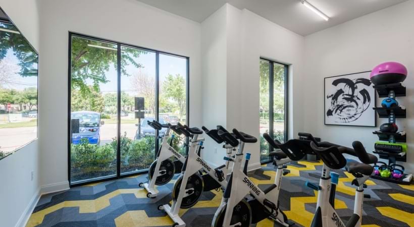24/7 Fitness Center with a Spin Studio at Our Apartments off Dallas North Tollway