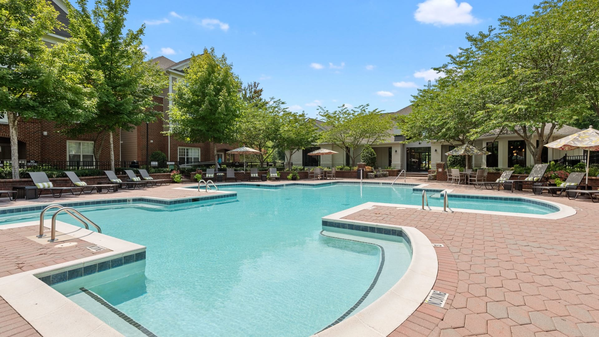 Resort-Style Pool and Sun Deck at Our North Raleigh Apartments
