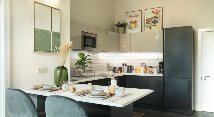 Kitchen with Wood-Style Flooring at Our Westside Apartments in Birmingham