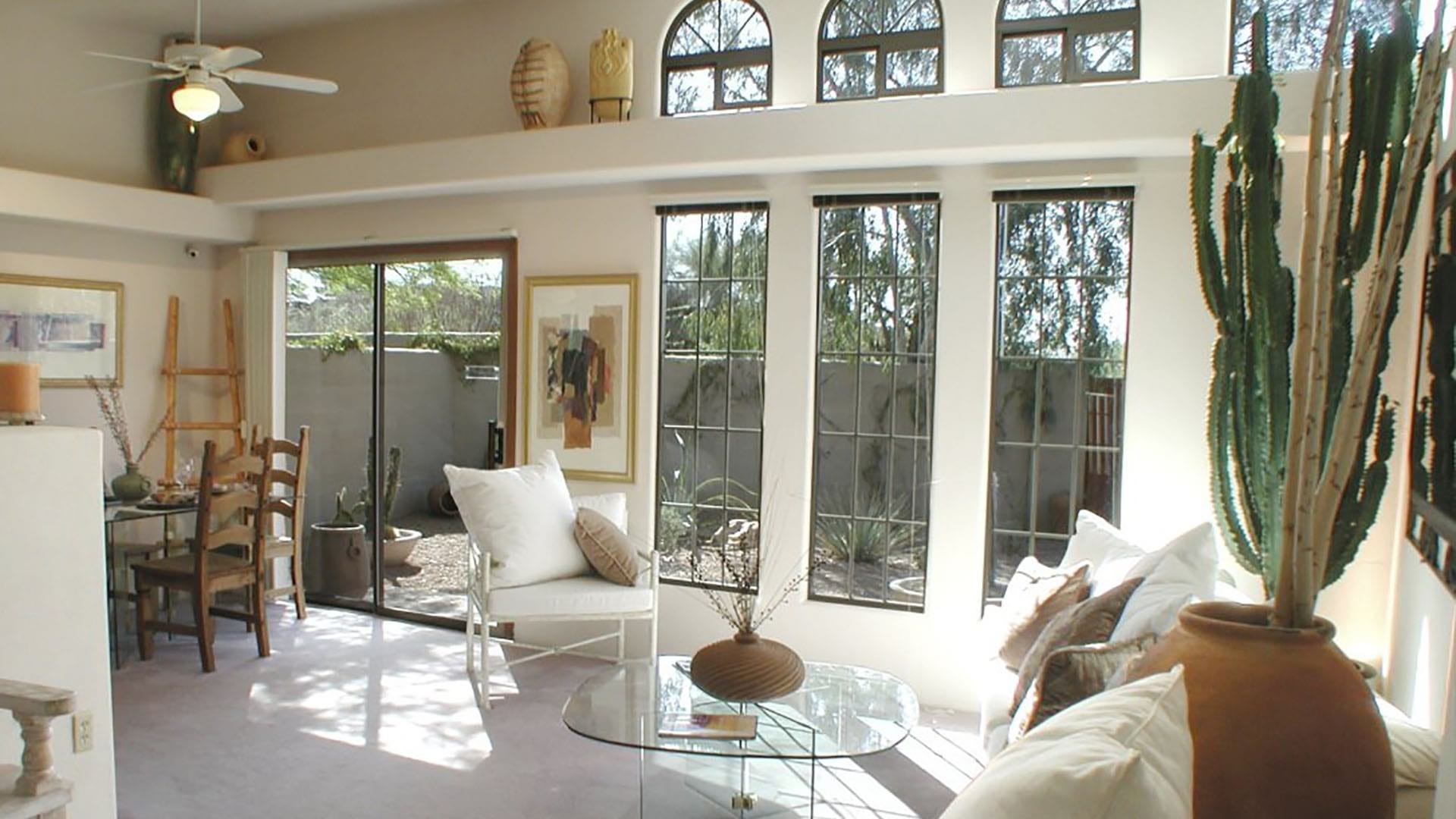Naturally-Lit, Living And Dining Rooms With Floor-To-Ceiling Windows At Our Casitas For Rent In Tucson