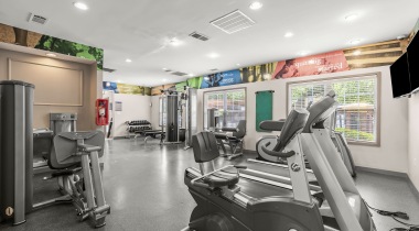24/7 Fitness Center with a Variety of Exercise Equipment at Our Luxury Apartments Near Perimeter Mall