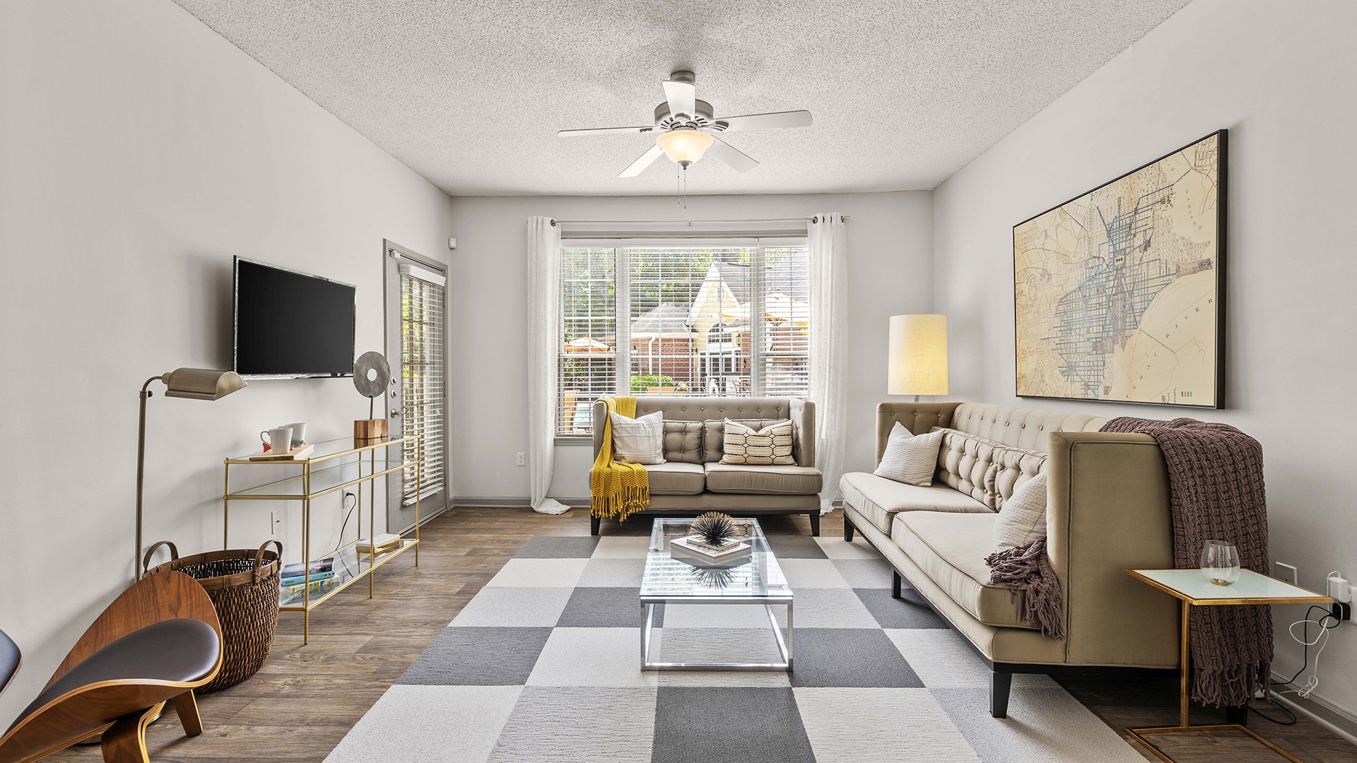 Modern Living Room with Wood-Style Flooring at Our Luxury Apartments in Sandy Springs, GA