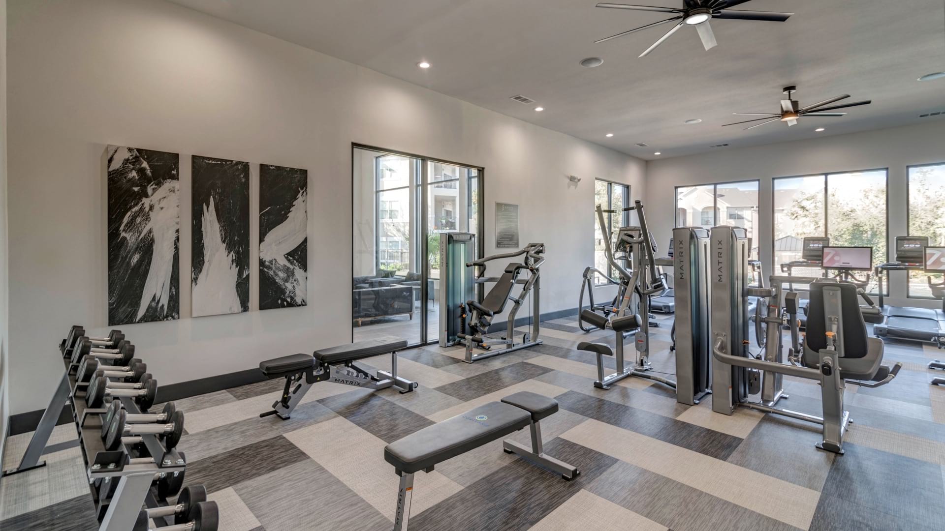 Brand new fitness center with cardio machines at our apartments at Bear Creek