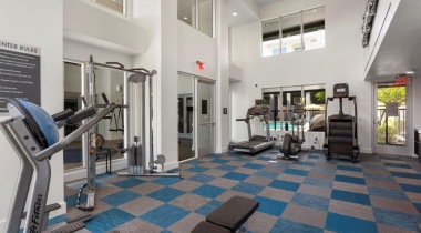 24/7 Fitness Center with Interactive Cardio