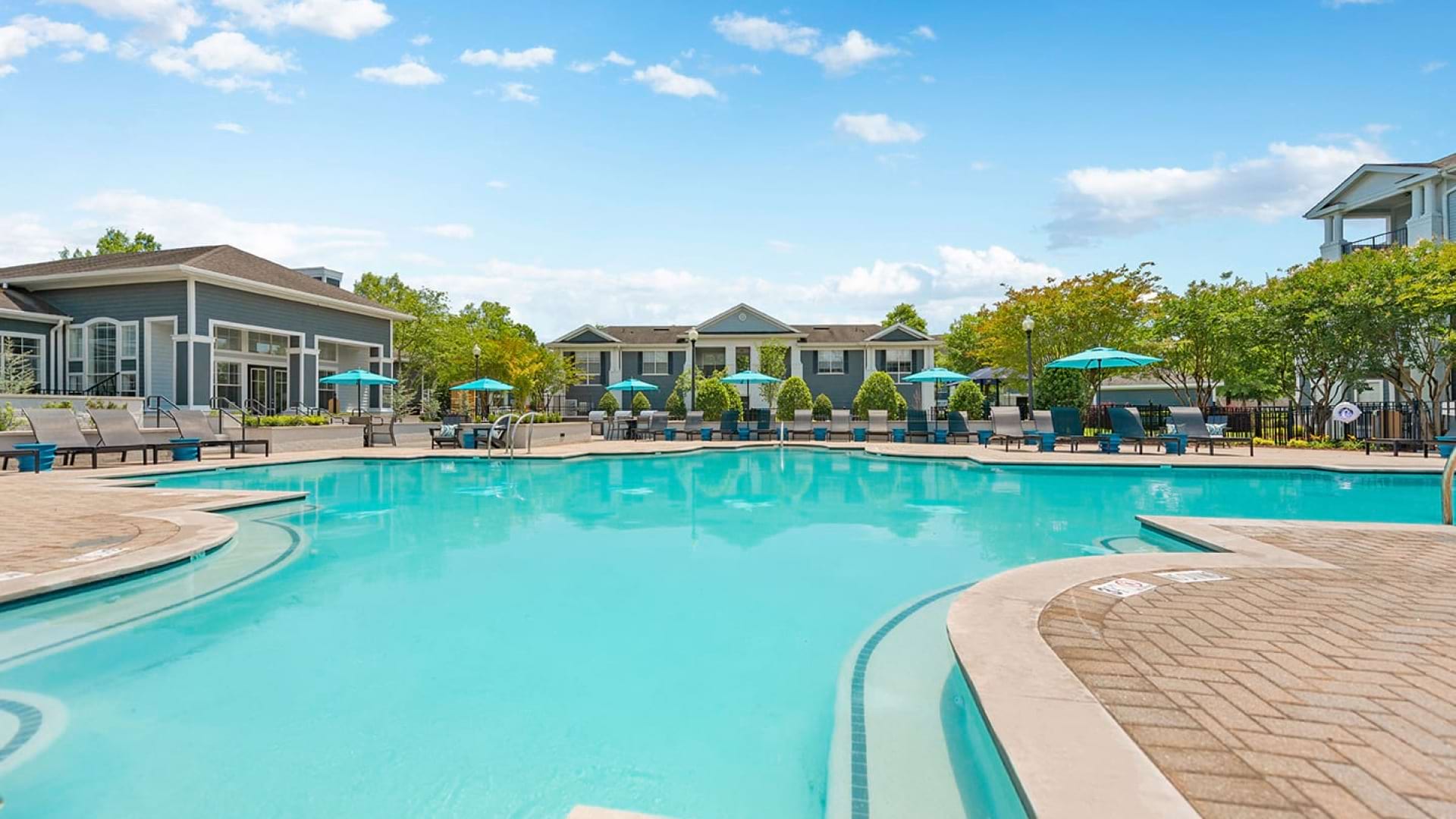 Resort-Style Pool and Lounge Chairs at Our Apartments for Rent in Brier Creek