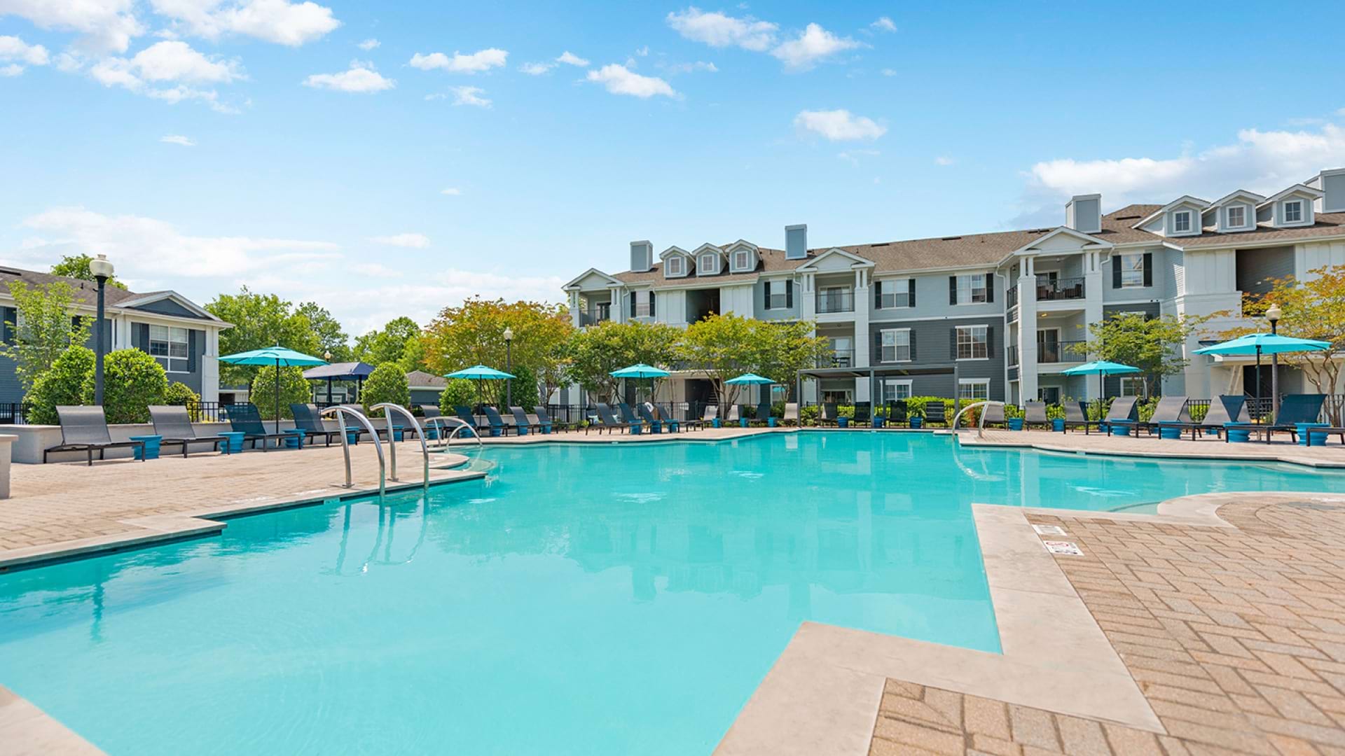 Resort-Style Pool and Lounge Chairs at Our Apartments for Rent in Brier Creek