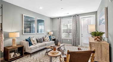 Well-lit living room with modern decor at our Cary apartments near Durham, NC
