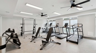 24/7 Fitness Center with Interactive Cardio