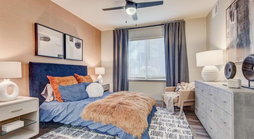 Spacious Bedroom with a Ceiling Fan at Our Apartments for Rent in Northglenn, CO