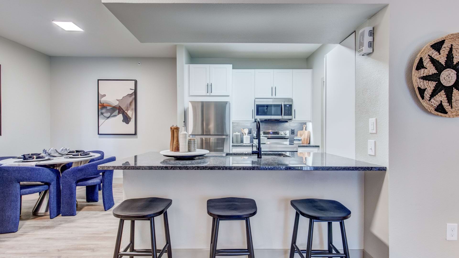Kitchen Area with Bar at Our Apartments for Rent in Northglenn, CO