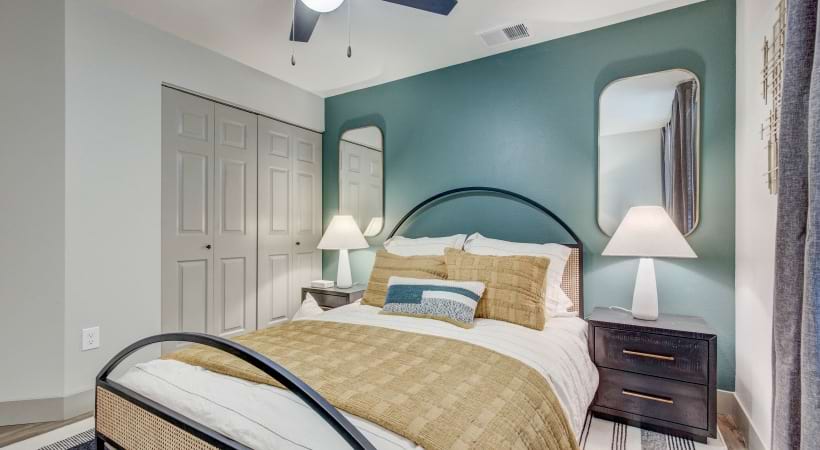 Spacious Bedroom with Wood-Style Flooring at Our Thornton Apartments for Rent