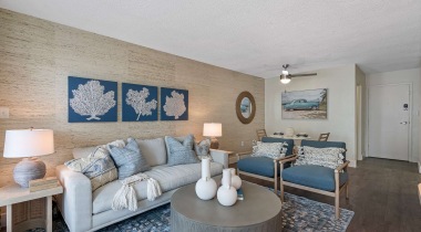 Spacious Living and Dining Area with Wood-Style Flooring at Our Daytona Beach Shores Apartments