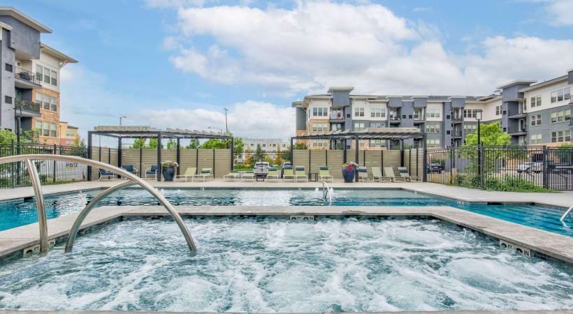 Pool with Heated Spa at Our Luxury Apartment Near Flat Irons Mall