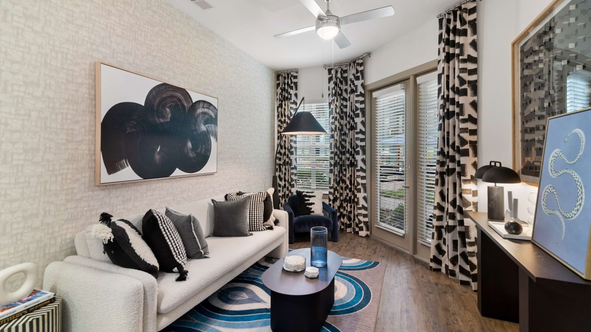Living Room with Wood-Style Floors in Our Apartments by the Galleria in Dallas, TX