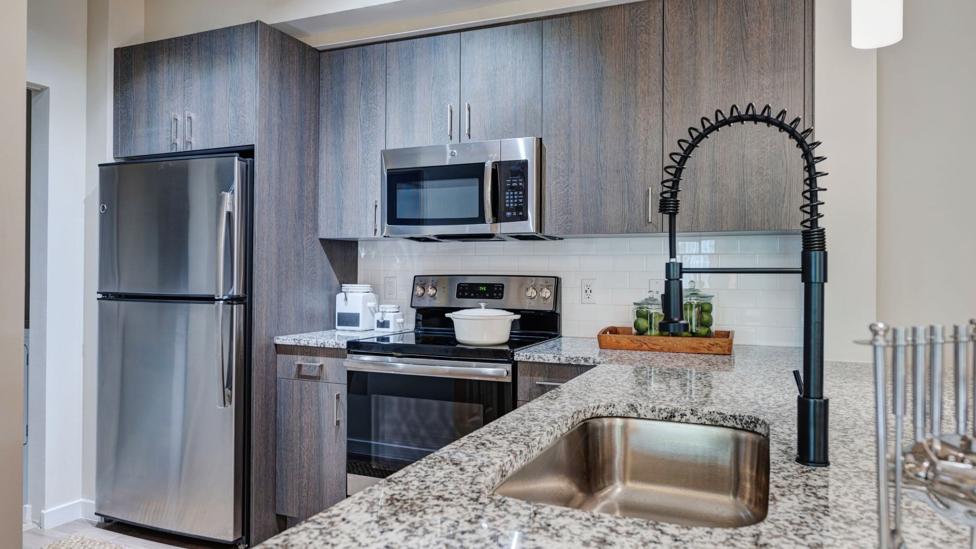 Kitchen With Stainless Steel Appliances at Our Cortland Hollywood Beach Apartments
