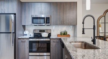 Kitchen With Modern Cabinetry at Our Apartments for Rent in Broward County