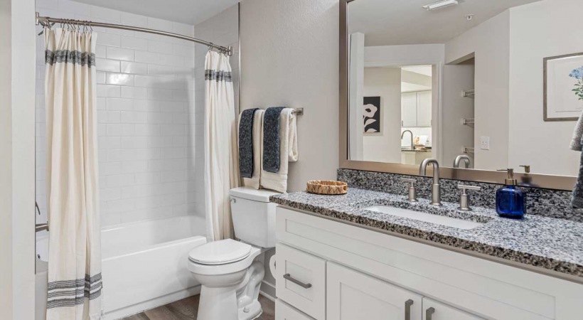Modern Bathroom With Framed Mirrors At Our Winter Garden, FL Apartments