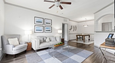 Open-Concept Living Space with a Ceiling Fan in Our Apartments for Rent in Alpharetta, GA
