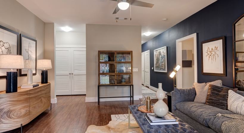 Living Room with Wood-Style Flooring in Our Apartments for Rent in League City, TX