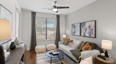 Open-concept living room at our upscale Stonebriar apartments in Frisco, TX