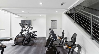 Our Stonebriar apartment gym with updated fitness equipment and HDTV