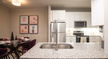 Kitchen with Stainless Steel Appliances at Our Mallard Creek Apartments in Charlotte, NC