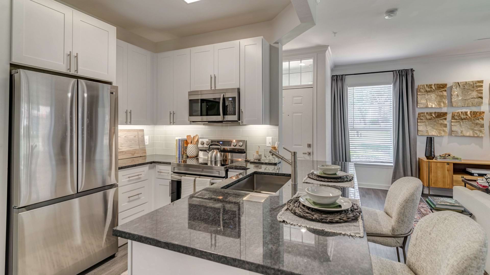 Kitchen with Stainless Steel Appliances at Our Apartments at Plano West