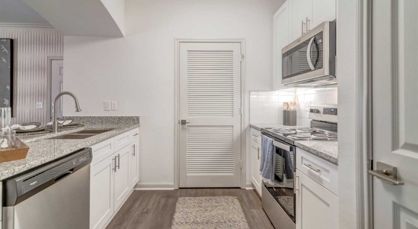 Kitchen with Ample Storage in Our Ridglea Apartments in Fort Worth, Texas