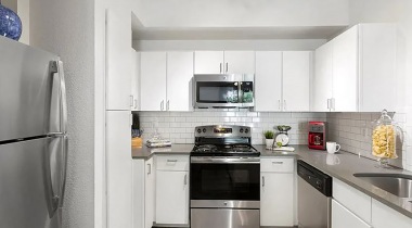 Kitchen with Stainless Steel Appliances at Our Luxury Apartments in North Austin