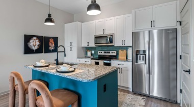 Kitchen with French-Door Refrigerator at Our Upscale Apartments near Riverview, FL