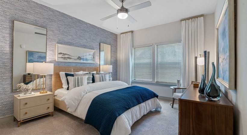 Bedroom with Ceiling Fans at Our Pinellas Park Apartments
