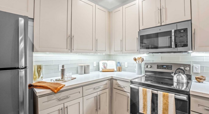Kitchen with Quartz Counters and Custom Cabinetry at Our Apartments Near ASU Tempe