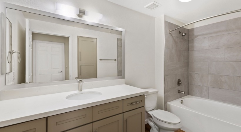 Deep-Soaking Bathtubs with Tile Surround in Select Homes at Our South Valley Apartment Homes