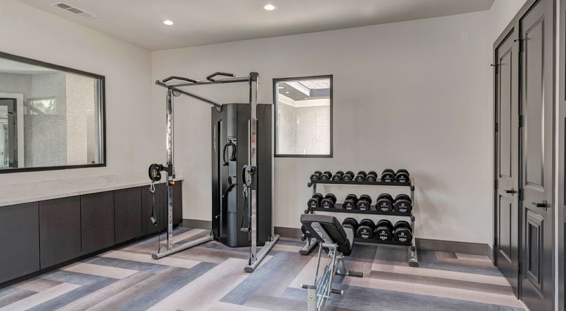 24/7 Fitness Center with Strength Training Equipment at Our Apartments on McDermott in Allen, TX
