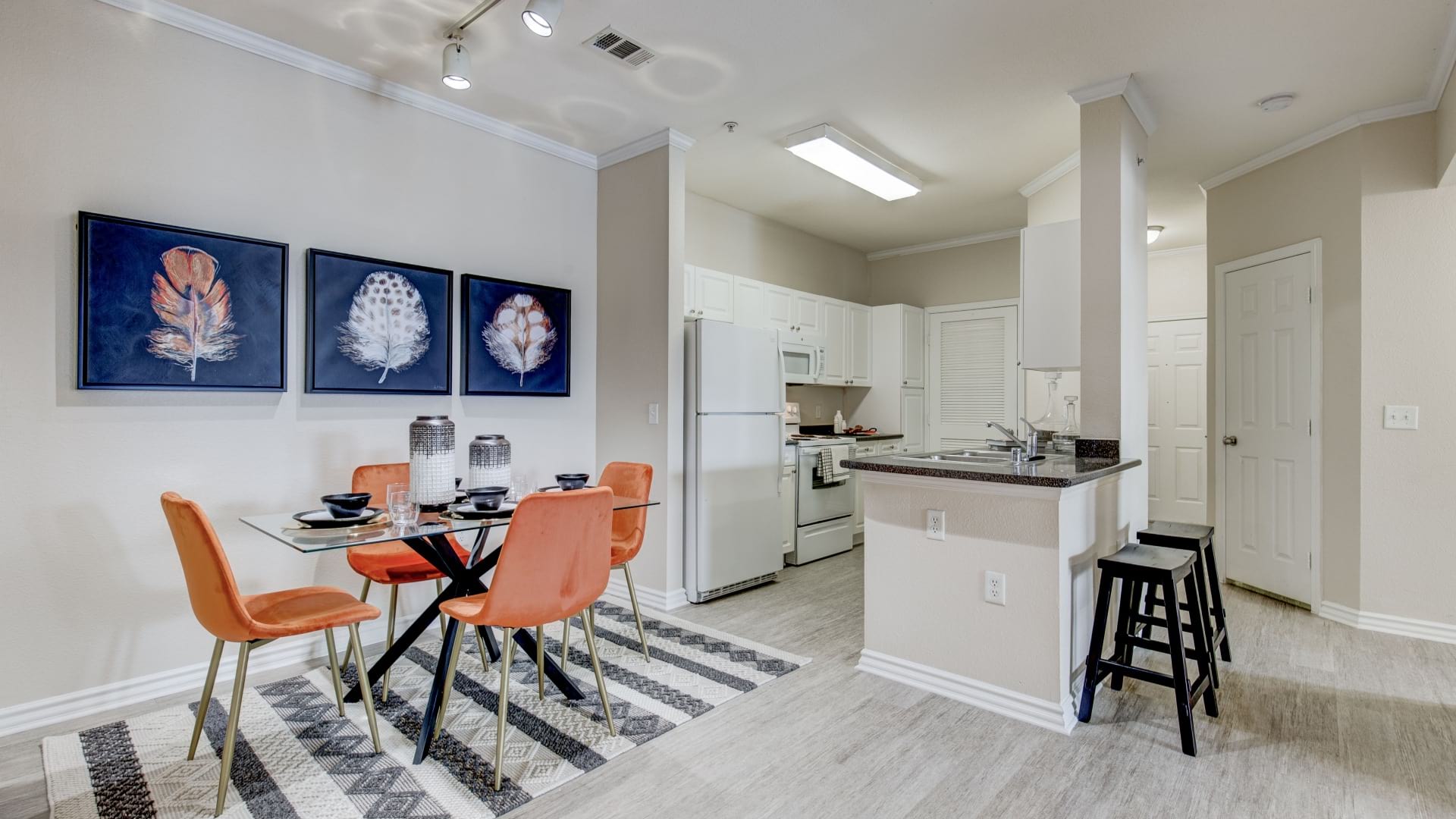 Dining Area Next to Kitchen at Our Northglenn Apartments near Front Range Community College