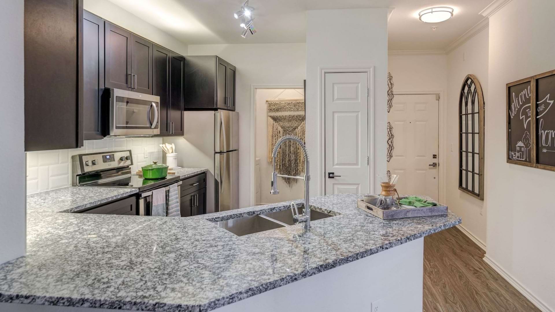 Apartment Kitchen With Granite Countertops At Our Luxury Apartments In South Austin, TX