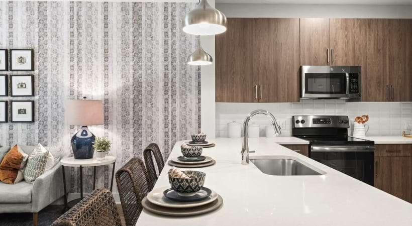 Upscale Kitchen with a Kitchen Breakfast Bar at Our Apartments Near Perimeter Center
