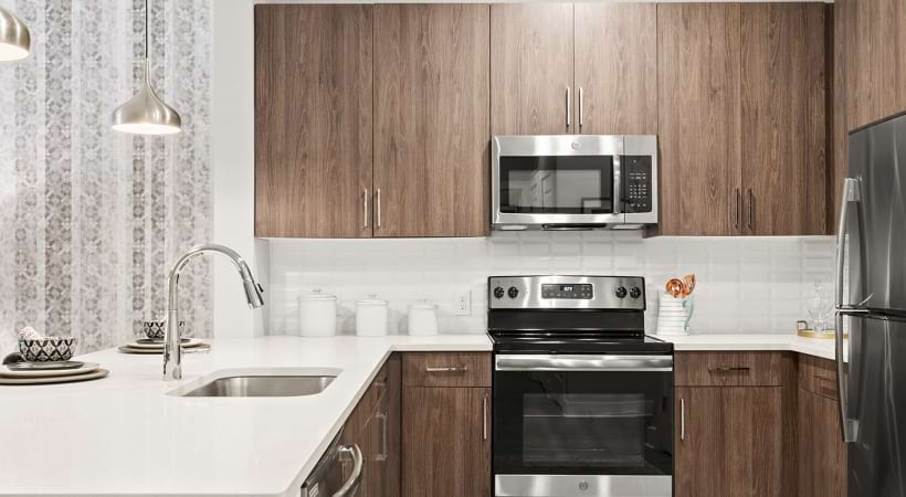 Kitchen with Stainless Steel Appliances  at Our Perimeter Center, Atlanta, GA Apartments