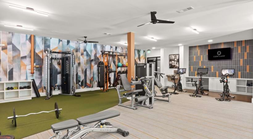 Spacious Fitness Center with Peloton® Bikes at Our Perimeter Center Apartments