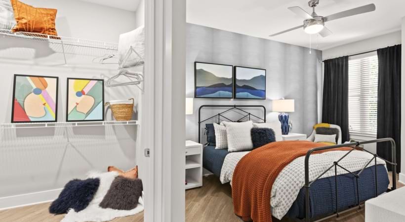 Bedroom with a Spacious Walk-In Closet at Our Chamblee Apartments