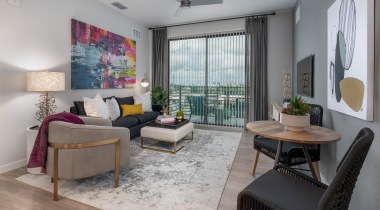 Upscale Living Room with Patio View at Our Apartments in Orlando, FL