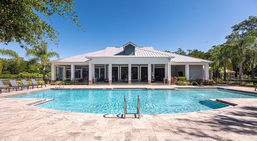 Resort-Style Pool and Sun Deck at Cortland Bermuda Lake 