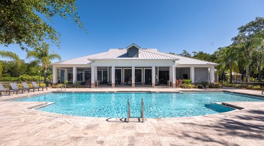 Resort-Style Pool and Sun Deck at Cortland Bermuda Lake 