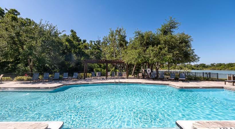 Resort-Style Pool and Sun Deck at Cortland Bermuda Lake