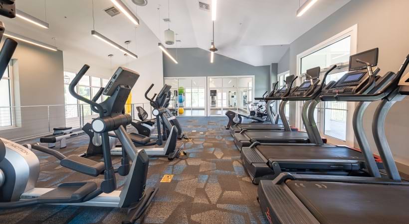 Two-Story, 24/7 Fitness Center and Yoga/Spin Studio at our waterfront apartment homes for rent