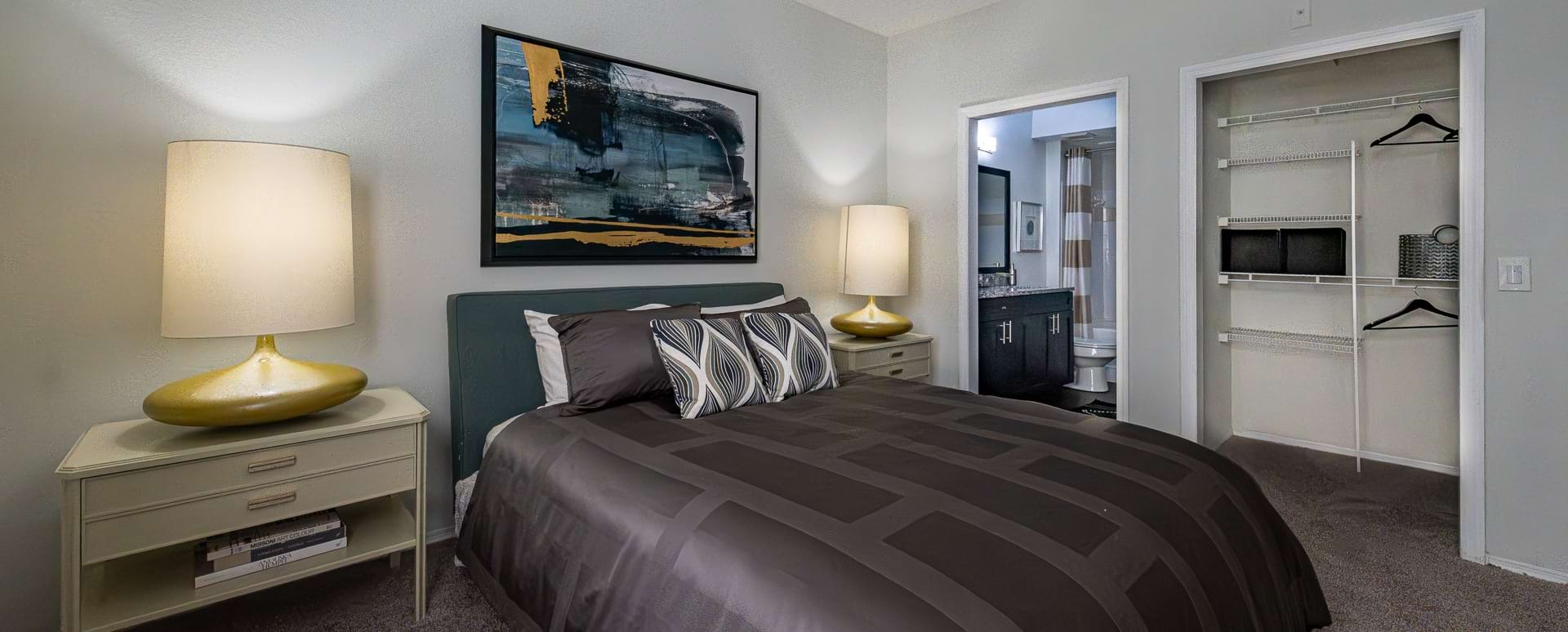 Bedroom with Spacious Walk-In Closet at Our Apartments Near St. Petersburg, FL