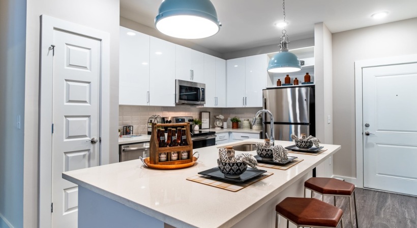 Upscale Kitchen with Energy-Efficient, Stainless Steel Appliances at Our Apartments Near Northside Hospital
